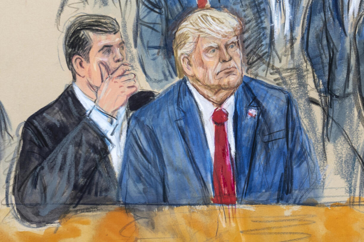 This artist sketch depicts former President Donald Trump, right, conferring with defense lawyer Todd Blanche, left, during his appearance at the Federal Courthouse in Washington, Thursday, Aug. 3, 2023. Trump pleaded not guilty in Washington's federal court to charges that he conspired to overturn the 2020 election.