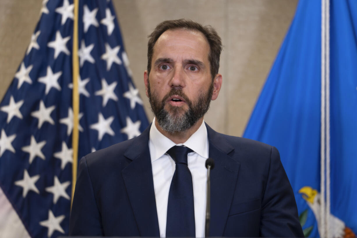 FILE - Special counsel Jack Smith speaks to the media about an indictment of former President Donald Trump, Aug. 1, 2023, at an office of the Department of Justice in Washington. Special counsel Jack Smith obtained search warrant for Twitter to turn over info on Trump's account, court documents say.  (AP Photo/J.