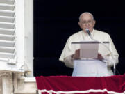 Pope Francis delivers his speech as he recites the Angelus noon prayer from the window of his studio overlooking St.Peter's Square, at the Vatican, Sunday, Aug. 27, 2023.