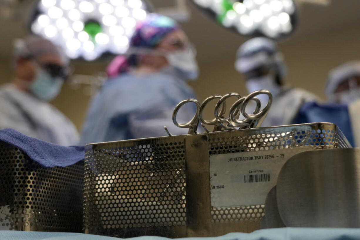 FILE - Instruments sit on a table in an operating room June 15, 2023, in Jackson, Tenn. Patients who take blockbuster drugs like Wegovy for weight loss may face life-threatening complications if they need surgery or other procedures that require empty stomachs for anesthesia. In June 2023, the American Society of Anesthesiologists issued guidance advising patients to skip daily weight-loss medications on the day of surgery and hold off on weekly injections for a week before any sedation procedures.