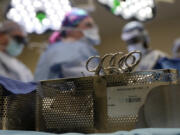 FILE - Instruments sit on a table in an operating room June 15, 2023, in Jackson, Tenn. Patients who take blockbuster drugs like Wegovy for weight loss may face life-threatening complications if they need surgery or other procedures that require empty stomachs for anesthesia. In June 2023, the American Society of Anesthesiologists issued guidance advising patients to skip daily weight-loss medications on the day of surgery and hold off on weekly injections for a week before any sedation procedures.