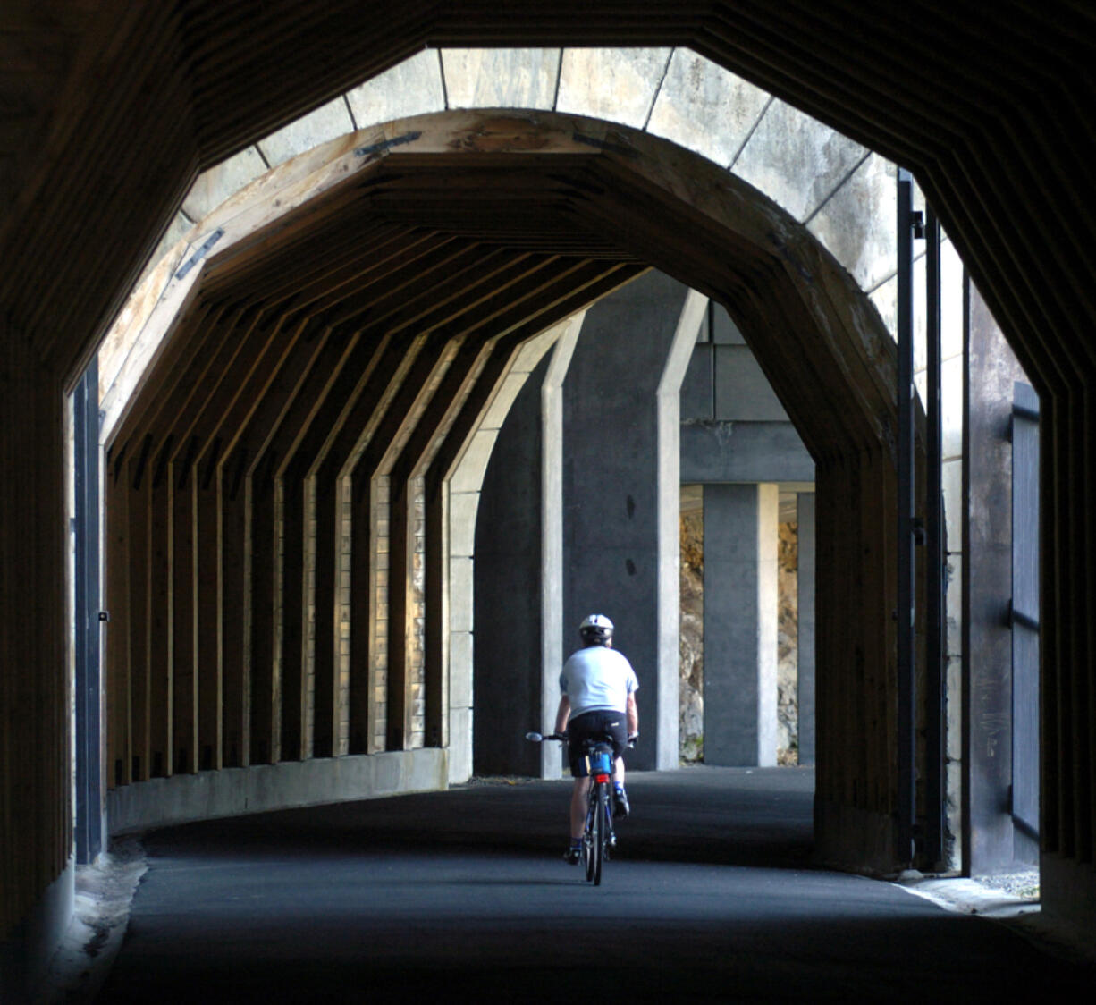 The Mosier Twin Tunnels offer unexpected thrills for cyclists exploring the Historic Columbia River Highway State Trail.