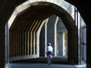 The Mosier Twin Tunnels offer unexpected thrills for cyclists exploring the Historic Columbia River Highway State Trail.