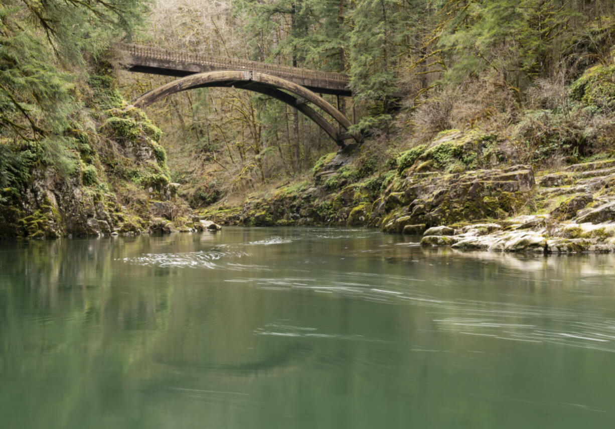 The East Fork Lewis River winds through the forest as seen from the Moulton Falls Bridge in northeastern Clark County.