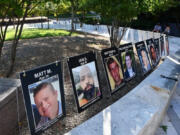 Photos of young overdose victims on display at an overdose awareness event in Rockville, Md., in August. Accidental overdose has become a primary cause of deaths for people under 40.