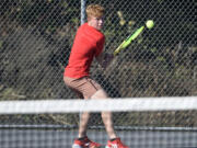 Tommy James of Camas hits a shot in a singles match against Aiden Bucerzan of Skyview at Camas High School on Monday, Sept. 18, 2023.