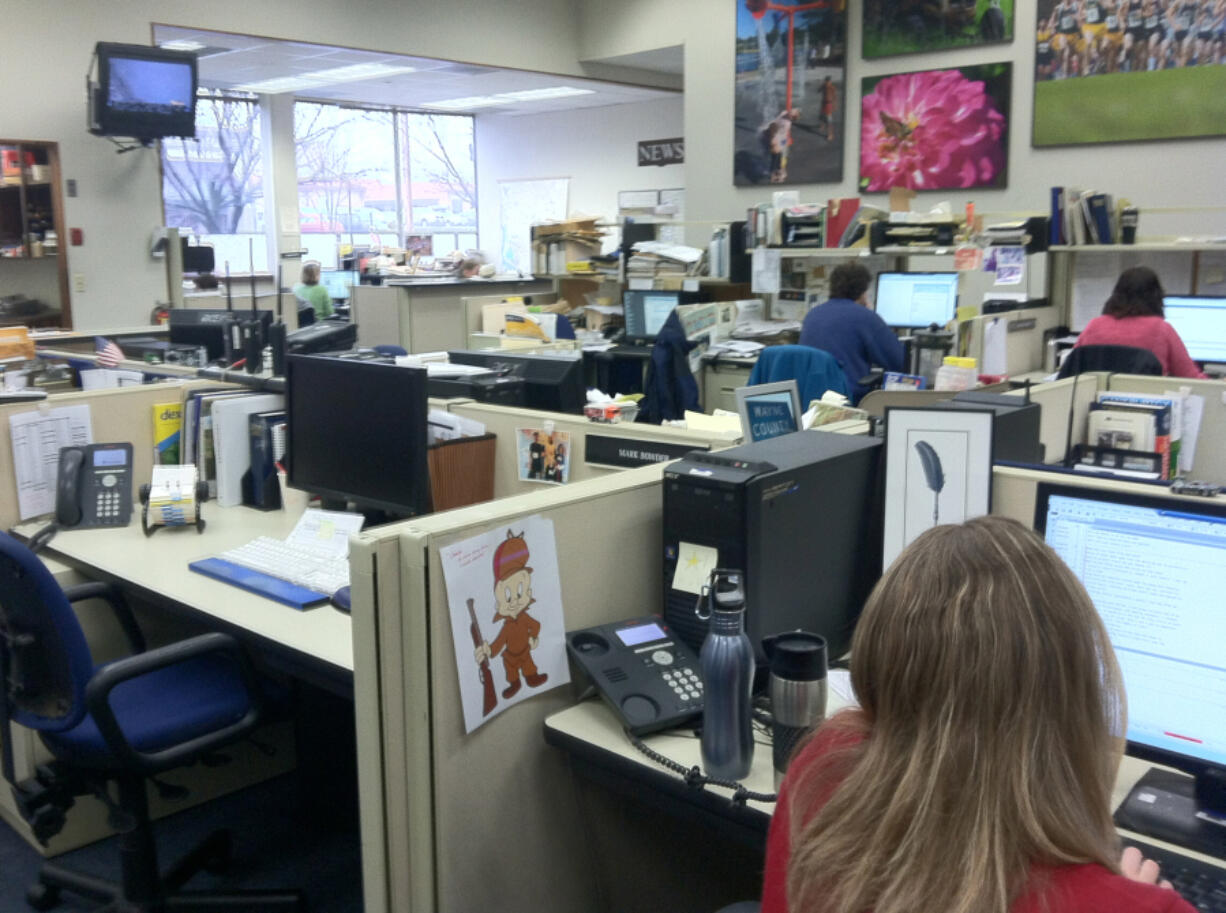 The Columbian files 
 Technology and the pandemic has substantially changed how Columbian reporters work, even in the 11 years since this newsroom photo was taken.