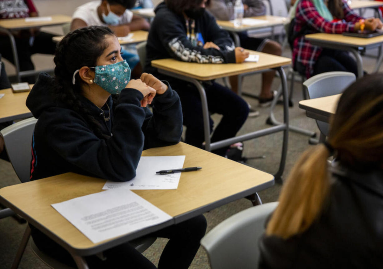 Anastasha Kathireson listens to Dean of Students Rosalia Burson lead their team in an exercise on day one of a two-day Jumpstart orientation program for incoming 9th graders  at Mount Tahoma High School in Tacoma, Wash., Aug. 25, 2021. About 120 students participated in the program, which is meant to help ease the transition to high school.