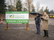 Clark County Food Bank President Alan Hamilton, right, and Board Chair Elson Strahan deliver speeches during a ground-breaking ceremony for the new Vision Center. Construction has been underway for since last fall.