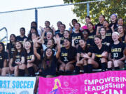 Yaneisy Rodriguez, a professional soccer player and Columbia River High graduate, poses for a photo with soccer players at Hudson's Bay High School as an ambassador for ELLA Sports Foundation, a non-profit dedicated to promoting and supporting Latina athletes on Friday, Sept. 22, 2023.