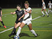 Camas’ Saige McCusker, right, and Union’s Ashley Elcock fight for possession of the ball on Tuesday, Sept. 26, 2023, at Union High School.