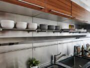 A long shelf helps to provide extra storage.