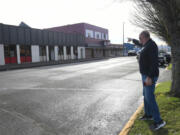 Director Frank Morrison points in January to 12th Avenue buildings Community House on Broadway would like to make into a youth shelter. Community House received a $5.3 million state grant to help fund the project but is still requesting $2.5 million from the county.