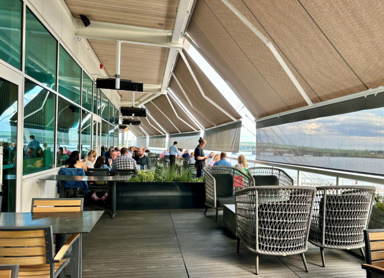 The outdoor patio at Willamette Valley Vineyards Tasting Room & Restaurant overlooks the Columbia River.