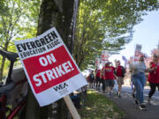 Striking educators keep in step as Evergreen Public Schools entered its fourth day in September 2023.