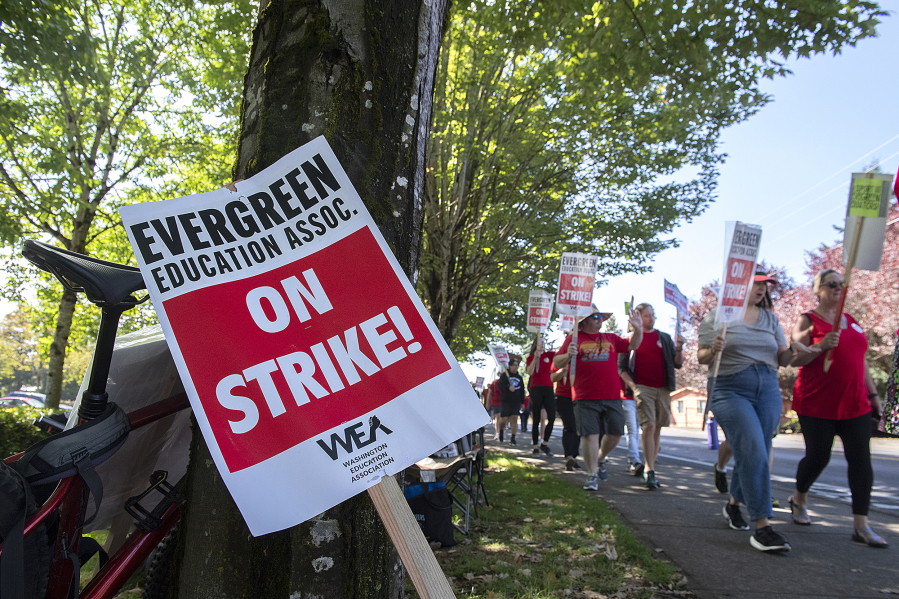 Striking educators keep in step as Evergreen Public Schools entered its fourth day in September 2023.