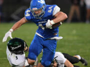 La Center senior Austin Nixon is tackles Friday, Sept. 8, 2023, during the Wildcats’ 24-8 win against Woodland at La Center High School.