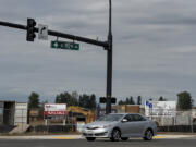A motorist passes by a development underway at Lacamas Square in southeast Vancouver. The retail center will include four buildings in its first phase, bringing in around 38,000 square feet of new retail space to the corner of N.E. 192nd Avenue and S.E. First Street.