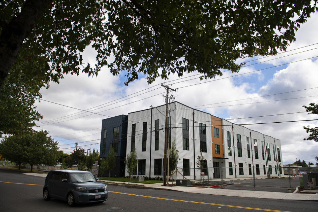 A motorist drives past Allegro Pointe on Northeast 65th Avenue in Vancouver. Vancouver Housing Authority hopes to purchase Allegro Pointe in November for mixed-income housing, including up to 23 units of low-income housing.