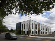 A motorist drives past Allegro Pointe on Northeast 65th Avenue in Vancouver. Vancouver Housing Authority hopes to purchase Allegro Pointe in November for mixed-income housing, including up to 23 units of low-income housing.