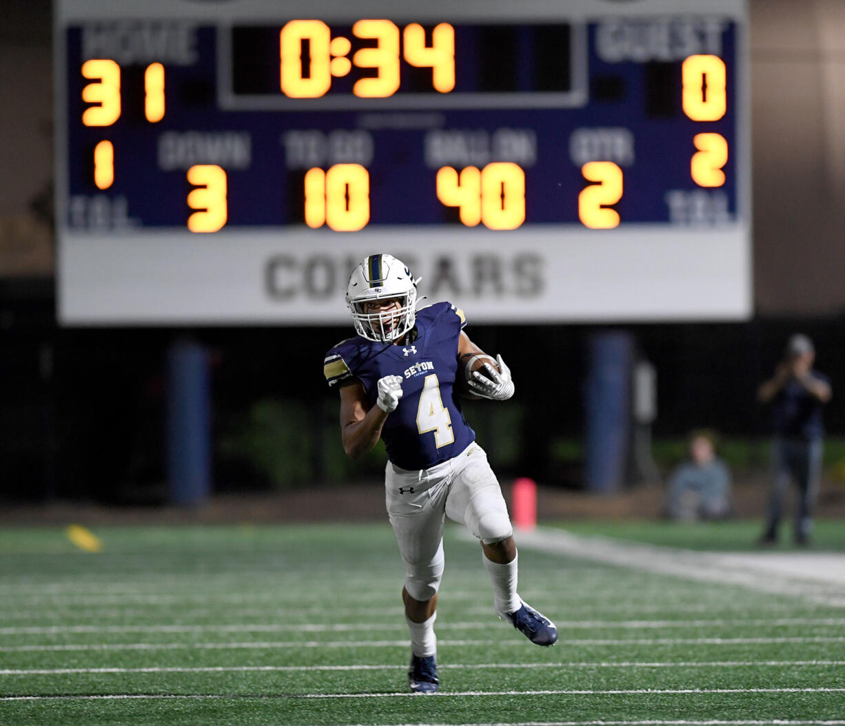 Seton Catholic junior Jacob Williams sprints down the field Friday, Sept. 22, 2023, during the Cougars’ 59-0 win against Stevenson at Seton Catholic High School.