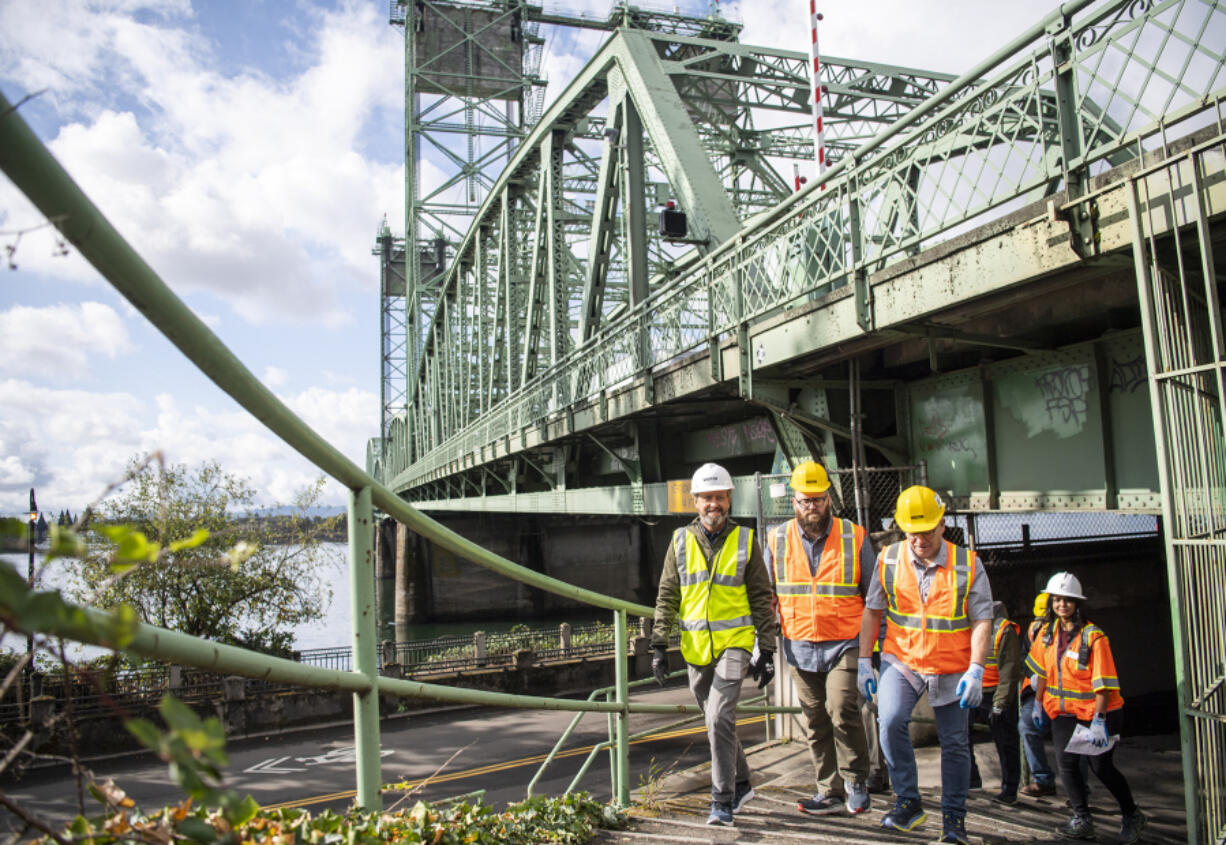 A bipartisan group of state lawmakers tours the Interstate 5 Bridge on Thursday. With many critical transportation projects in the state, developing the transportation budget is as much an art as it is a science, said Sen. Marko Liias, D-Everett, second from left, the chair of the Senate Transportation Committee.