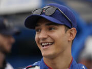 Alex Palou prepares before the start an IndyCar auto race at World Wide Technology Raceway, Sunday, Aug. 27, 2023, in Madison, Ill.