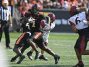 Oregon State running back Deshaun Fenwick (1) rushes during the second half of an NCAA college football game against San Diego State, Saturday, Sept. 16, 2023, in Corvallis, Ore.