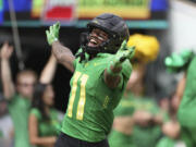 Oregon wide receiver Troy Franklin celebrates after scoring a touchdown against Colorado during the first half of an NCAA college football game, Saturday, Sept. 23, 2023, in Eugene, Ore.