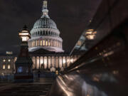 The Capitol is seen late Tuesday night, Sept. 26, 2023, in Washington, as lawmakers work to advance appropriations bills on the House floor. The Republican-controlled House and the Democrat-controlled Senate are starkly divided over very different paths to preventing a federal shutdown. (AP Photo/J.