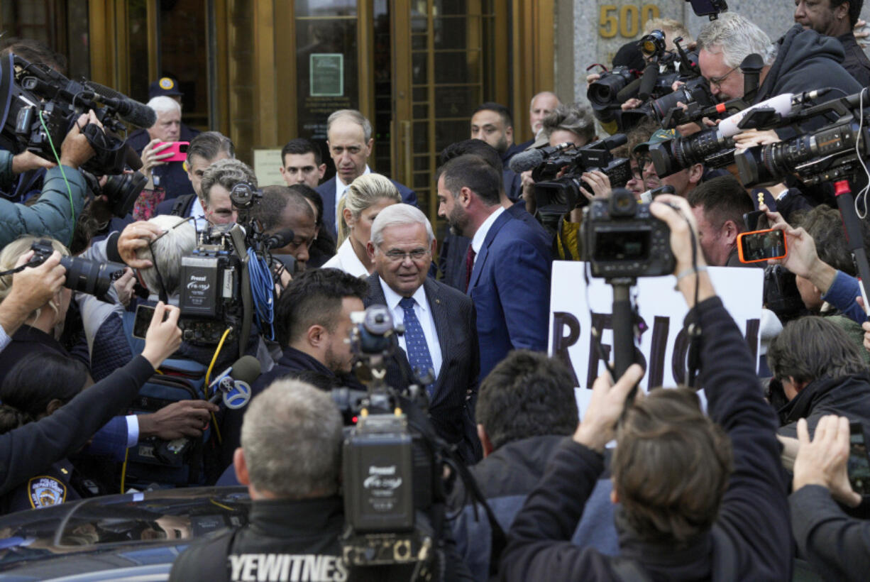 Sen. Bob Menendez and his wife, Nadine Menendez, leave federal court, Wednesday, Sept. 27, 2023, in New York.