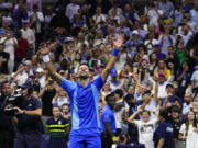 Novak Djokovic, of Serbia, reacts after defeating Daniil Medvedev, of Russia, in the men's singles final of the U.S. Open tennis championships, Sunday, Sept. 10, 2023, in New York.