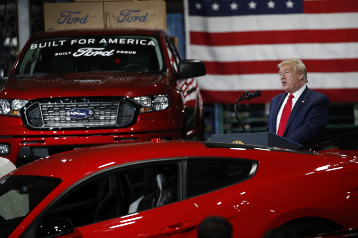 FILE - President Donald Trump speaks at Ford's Rawsonville Components Plant that has been converted to making personal protection and medical equipment, Thursday, May 21, 2020, in Ypsilanti, Mich. Former President Donald Trump will skip the second GOP presidential debate next week to travel to Detroit as the auto worker strike enters its second week.