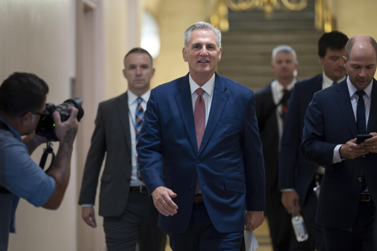 Speaker of the House Kevin McCarthy, R-Calif., arrives to meet with the House Republican Conference about launching an impeachment inquiry into President Joe Biden, at the Capitol in Washington, Thursday, Sept. 14, 2023. (AP Photo/J.