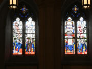 Light shines through new stained-glass windows with a theme of racial justice Sept. 2 during an unveiling and dedication ceremony at the Washington National Cathedral for the window in Washington.