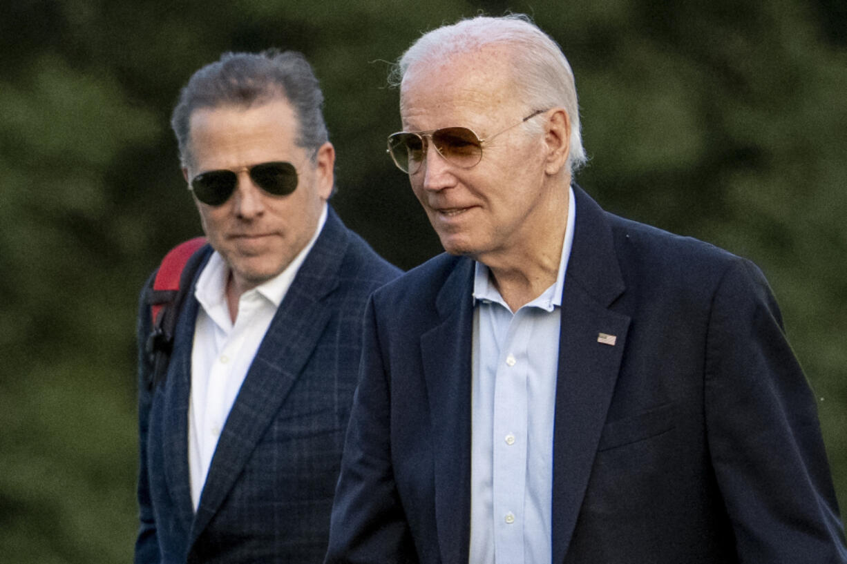 FILE - President Joe Biden, and his son Hunter Biden arrive at Fort McNair, Sunday, June 25, 2023, in Washington.