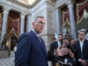 FILE - Speaker of the House Kevin McCarthy, R-Calif., talks to reporters at the Capitol in Washington, Monday, July 17, 2023. McCarthy faces a political standoff when the House resumes this week. He needs to steer the House to fund the government and avoid a government shutdown. But he's also trying to launch an impeachment inquiry into President Joe Biden over his son Hunter Biden's business dealings. (AP Photo/J.