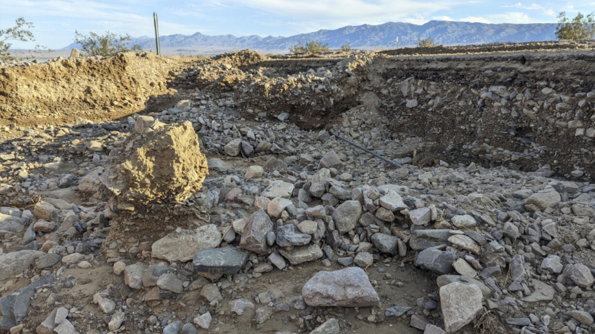 This undated photo released by the National Park Service shows California State Route 190 (SR 190) missing shoulders and undercut in several areas in Death Valley National Park, Calif., after Tropical Storm Hilary dropped more than 2 inches of rain on the park in August. On Monday, Sept. 4, 2023, officials say it could take months for the park to reopen to visitors after the storm.