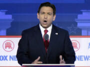 FILE - Republican presidential candidate Florida Gov. Ron DeSantis speaks during a Republican presidential primary debate hosted by FOX News Channel, Aug. 23, 2023, in Milwaukee. DeSantis says he got a $1 million cash bump after Wednesday night's presidential debate. His campaign says that amount came in over the first 24 hours after DeSantis and seven other contenders met in Milwaukee.