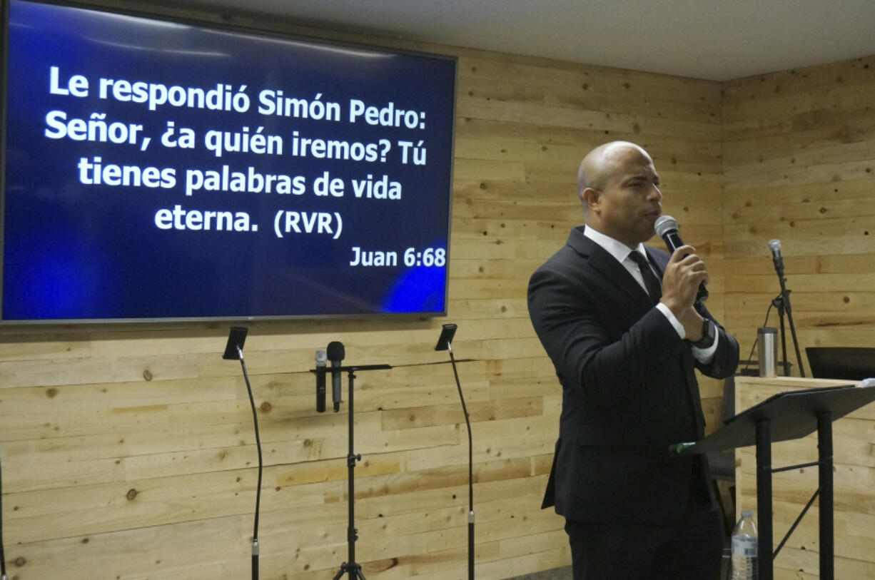 The Rev. Gustavo Castillo preaches Sept. 24 at the Iglesia Pentecostal Unida Latinoamericana in Columbia Heights, Minn.