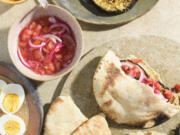 Charred Eggplant Pita Sandwiches With Spicy Tahini.