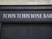 The Tchin Thin wine bar is seen in Bordeaux, southwestern France, Thursday, Sept.14, 2023. A 32-year-old woman died in France and eight other people remained hospitalized Thursday after an apparent botulism outbreak linked to homemade sardine preserves and the wine bar in Bordeaux, according to regional health officials. At least 10 people who ate in the restaurant between Sept. 4 and Sept. 10 were hospitalized, most of them in intensive care or critical condition. All had consumed sardine preserves served by the restaurant, the Tchin Tchin Wine Bar.