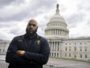 TSA employee John Hubert of Miami poses for a portrait on Capitol Hill, Friday, Sept. 22, 2023, in Washington.  Hubert, an airport security officer in Fort Lauderdale, Fla., recalls helping fellow Transportation Security Administration workers get essentials from food banks when they worked without pay during the last government shutdown.