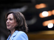 FILE - Vice President Kamala Harris tours McKinstry's facilities after giving remarks ahead of the one-year anniversary of the Biden administration's Inflation Reduction Act, Aug. 15, 2023, in Seattle. Harris is visiting Indonesia this week for the Association of Southeast Asian Nations summit.