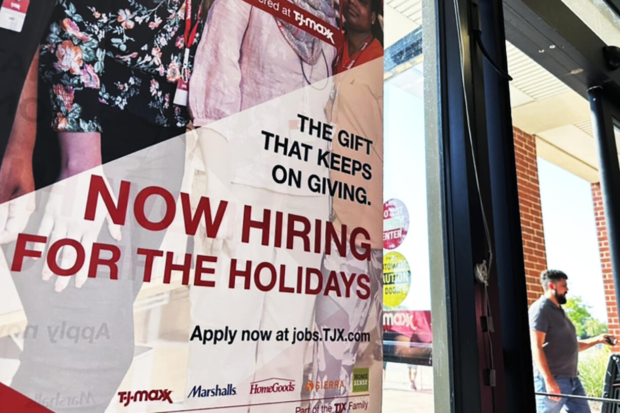 FILE - A hiring sign is displayed at a retail store in Vernon Hills, Ill., Thursday, Aug. 31, 2023. A year ago, Chair Jerome Powell warned that the Fed was prepared to be similarly aggressive toward high inflation, saying its rate hikes would cause "some pain" in the form of higher unemployment. Over time, as the job market has displayed surprising resilience, Powell has adopted a more benign tone. At a news conference last week, he suggested that a soft landing remains a "possible," if not guaranteed, outcome. (AP Photo/Nam Y.