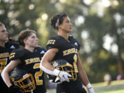 Rafael Bauman (1) stands with his teammates as they listen to the national anthem prior to the Eagles’ game against Heritage at Kiggins Bowl on Friday, Sept. 1, 2023.