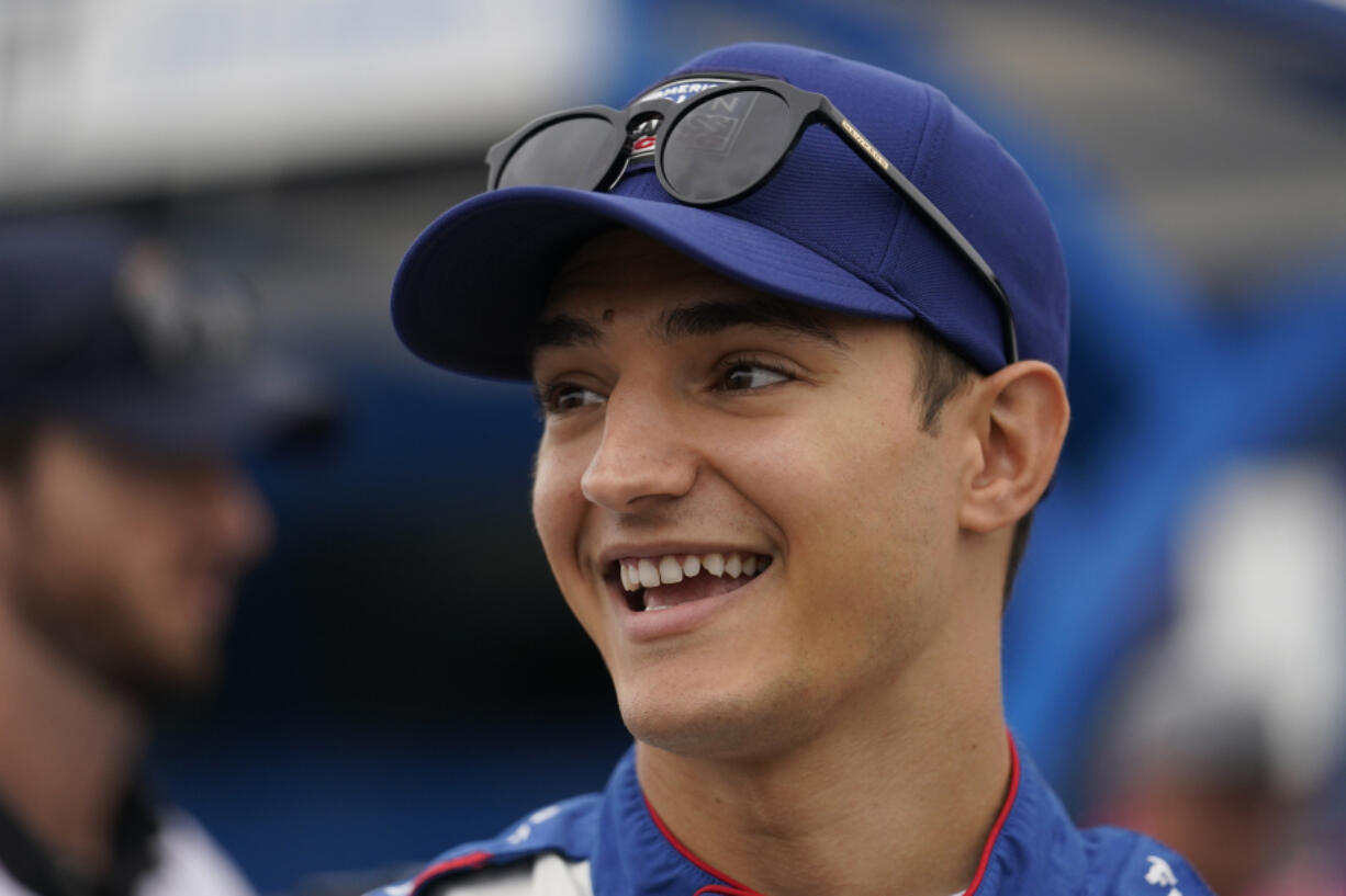 Alex Palou prepares before the start an IndyCar auto race at World Wide Technology Raceway, Sunday, Aug. 27, 2023, in Madison, Ill.