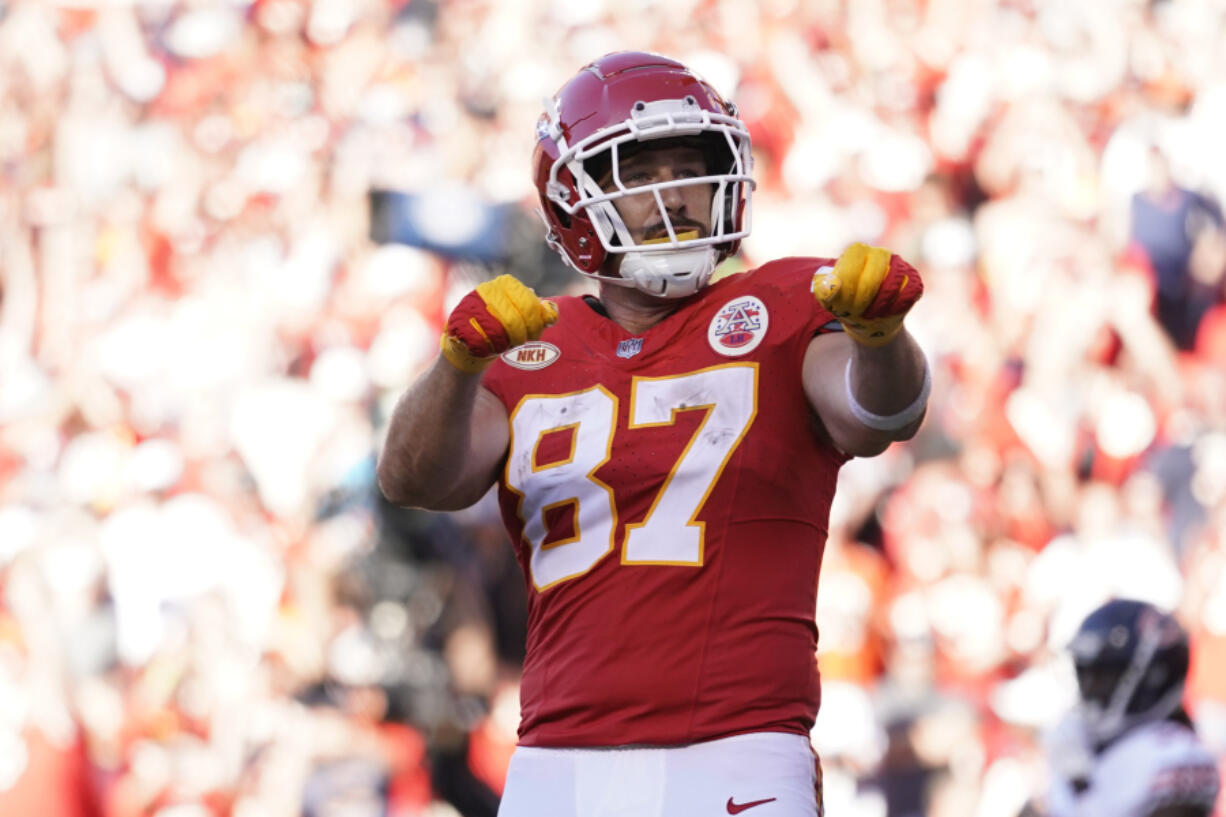 File - Kansas City Chiefs tight end Travis Kelce celebrates after scoring during the second half of an NFL football game against the Chicago Bears Sunday, Sept. 24, 2023, in Kansas City, Mo.  Following Taylor Swift's appearance at the game, jersey sales for the All-Pro tight-end seemingly skyrocketed.