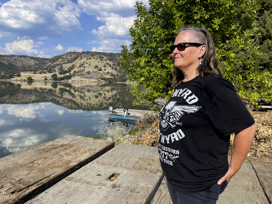 Sami Jo Difuntorum, Cultural Preservation Officer, Shasta Indian Nation, looks out on Sunday, Sept. 17, 2023, at a reservoir from Copco 1 damn, that will be drawn down next year as part of the largest dam removal project in United States history. The Shasta Indian Nation hopes to reclaim some of its land which was flooded when the dams were built a century ago.