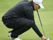 Perrine Delacour, of France, lines up a putt on the 18th hole during the first round of the LPGA Portland Classic golf tournament in Portland, Ore., Thursday, Aug. 31, 2023.